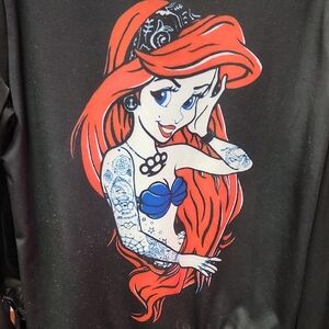 Black Graphic Tee with Red and Blue Cartoon Design
